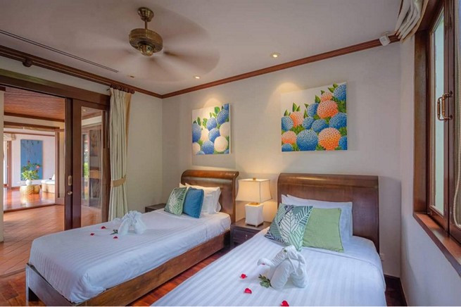 Experience Tranquil Luxury  3 Bed  4 Bath Oasis in Cherng Talay-6